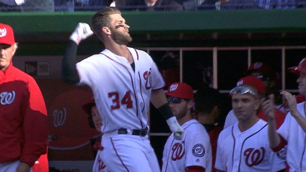 Bryce Harper hits 1st slam, 100th HR in Nationals win over Braves