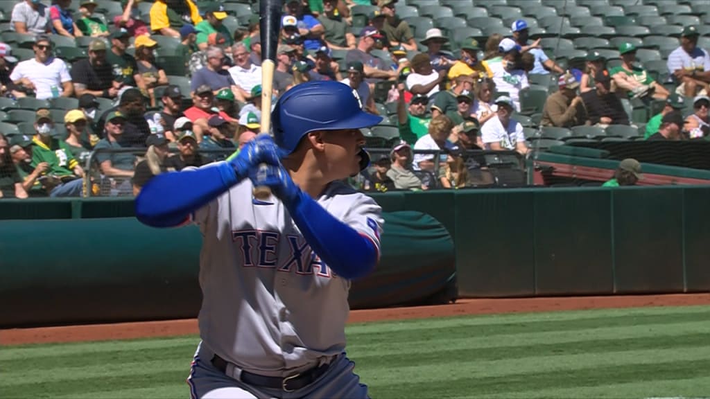 Texas Rangers' Jonah Heim runs the bases after a solo home run in