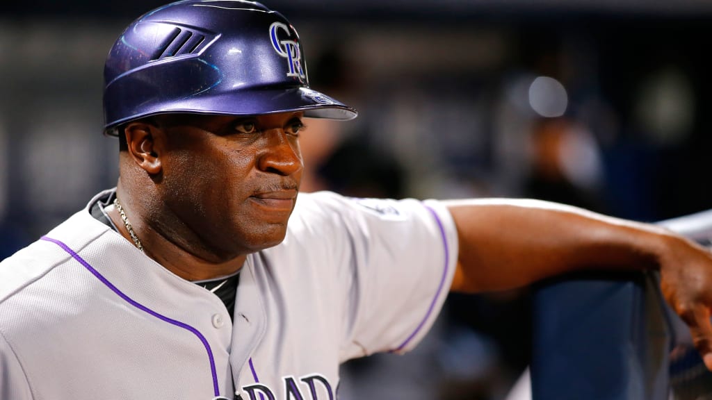 Rockies first-base coach Eric Young looked up to Ozzie Smith growing up, and got the chance to play alongside Smith at the 1996 All-Star Game. (Getty)