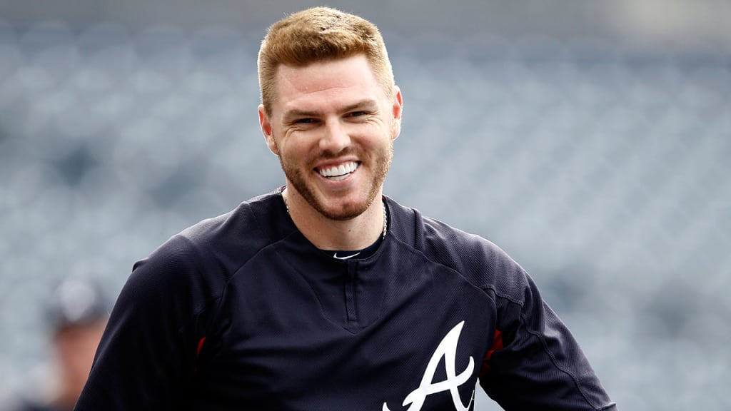 Freddie Freeman was with the Braves for batting practice Wednesday in San Diego. (AP)