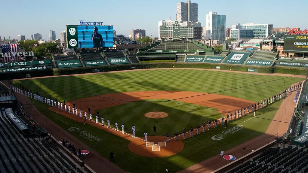 Battle between Cubs and Wrigley rooftops heating up