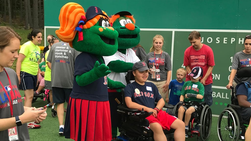 Ryan Murdock is joined by Red Sox mascots Wally and Tessie at Saturday's Miracle League event. (Craig Forde)