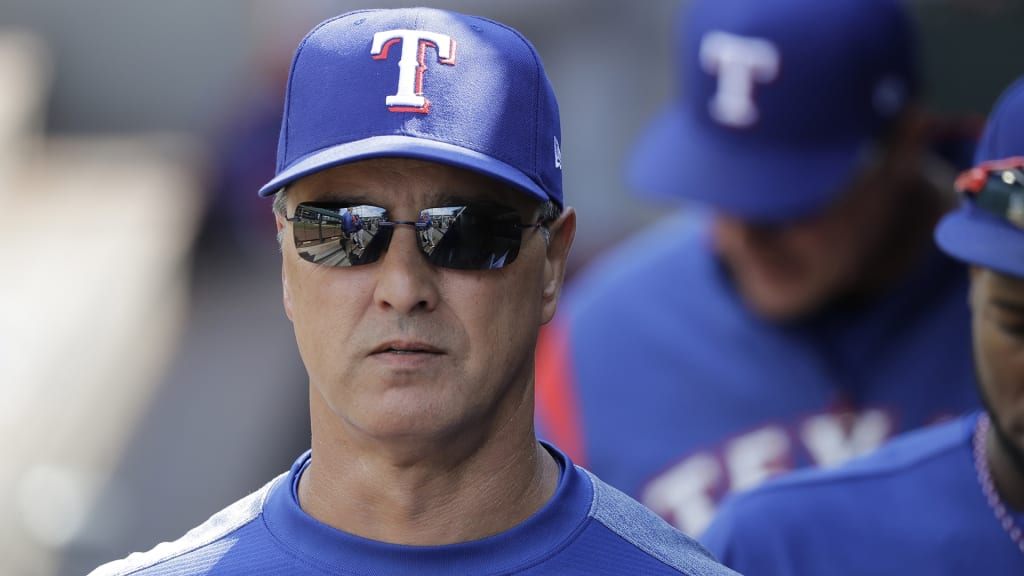 Texas Rangers bench coach Don Wakamatsu walks in the dugout after a baseball game against the Seattle Mariners, Wednesday, May 16, 2018, in Seattle. (AP Photo/Ted S. Warren)
