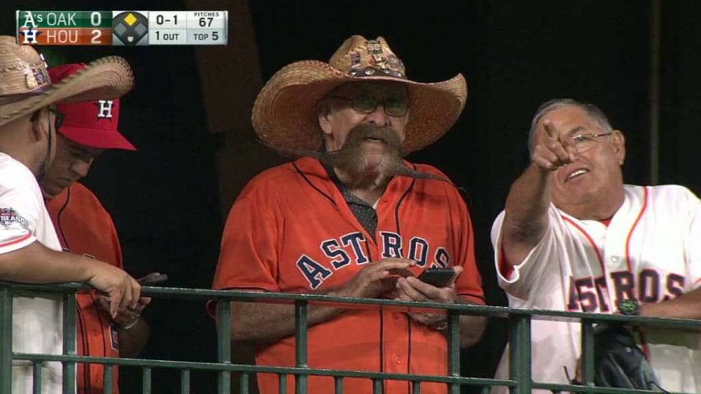 This Astros fan's mustache is at least three times as wide as his face