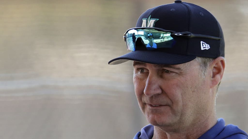 Seattle Mariners manager Scott Servais watches during spring training baseball practice Tuesday, Feb. 12, 2019, in Peoria, Ariz. (AP Photo/Charlie Riedel)