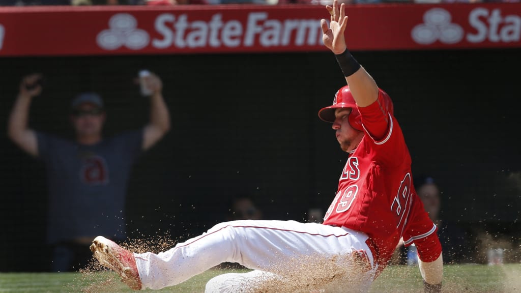 Taylor Ward scores on a single by David Fletcher in the eighth inning against the Chicago Cubs in an exhibition baseball game in Anaheim, Calif., Sunday, April 3, 2016. (AP Photo/Christine Cotter)