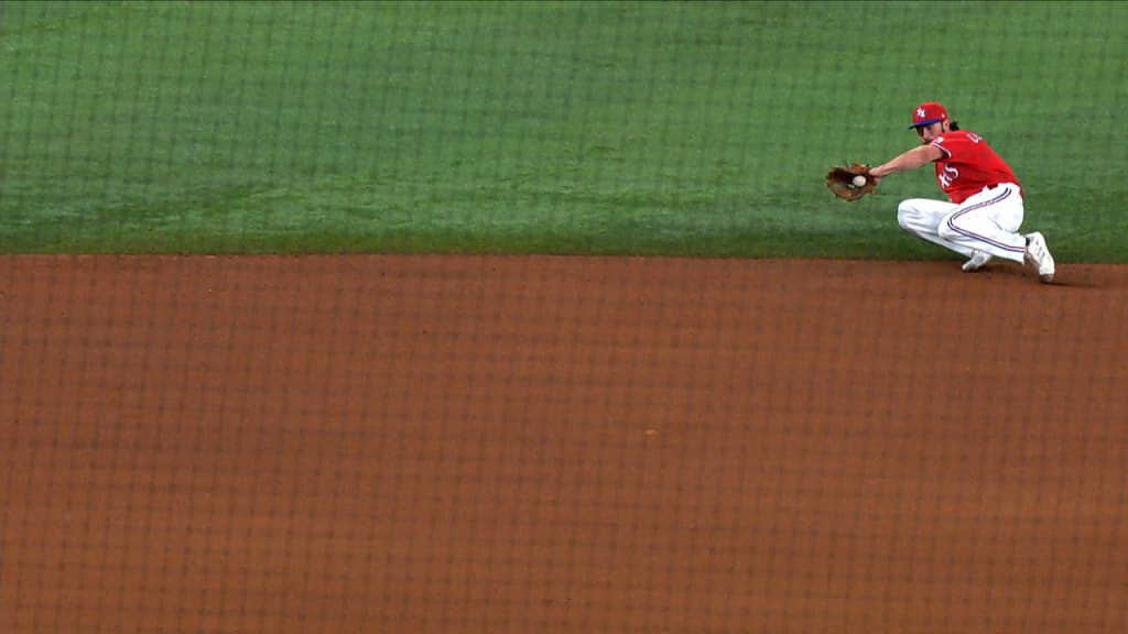 Colorado Rockies shortstop Charlie Culberson (23) makes the throw