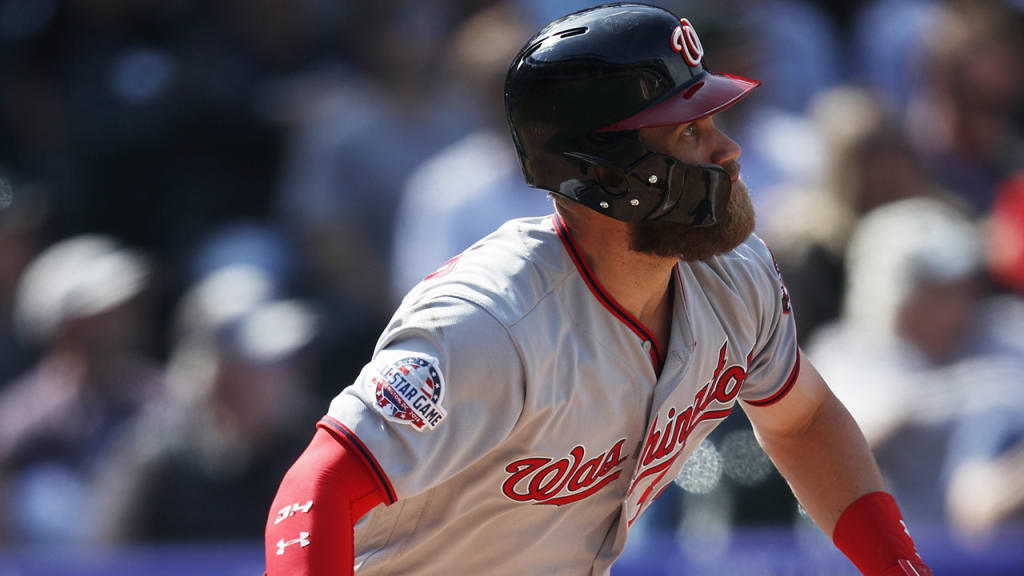 Washington Nationals' Bryce Harper follows the flight of his double off Colorado Rockies starting pitcher Tyler Anderson in the fourth inning of a baseball game Sunday, Sept. 30, 2018, in Denver. (AP Photo/David Zalubowski)