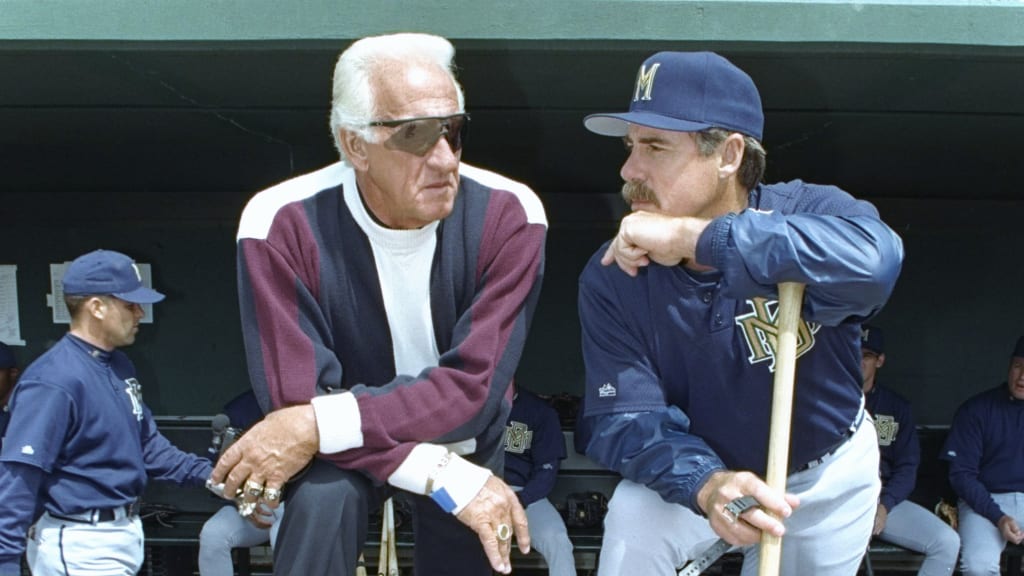 Bob Uecker and Phil Garner chat before a game against the Rangers on April 1, 1997.