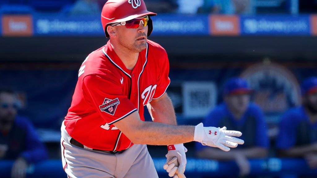 Ryan Zimmerman and Max Scherzer wore full Caps gear while leading