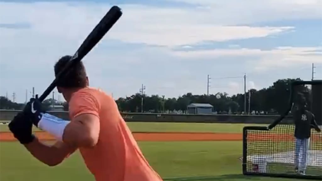 Tom Brady takes batting practice with Rob Gronkowski