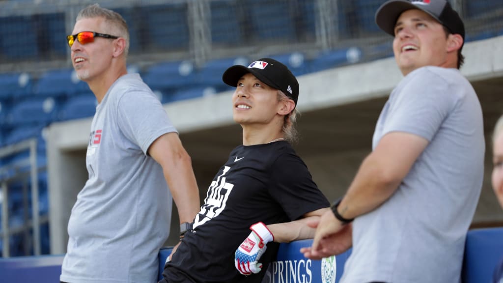 Kunz, right, admires some dingers