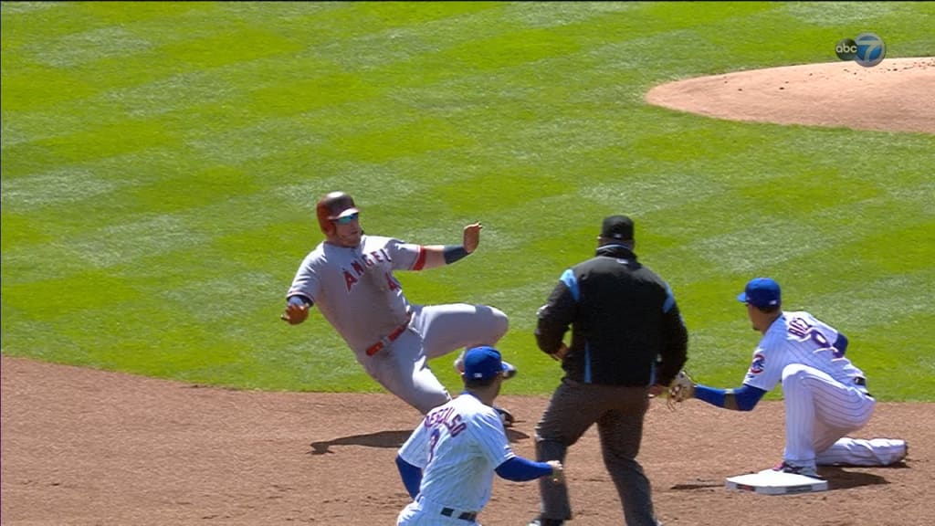 Atlanta Braves Marquis Grissom is tagged out at home plate by