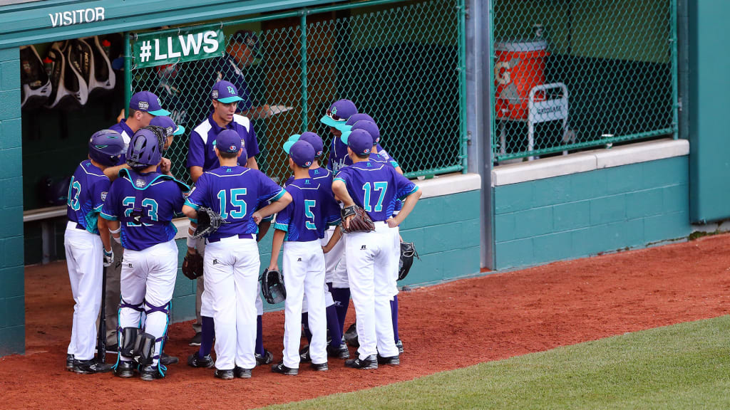 Italy's Little Leaguers huddle around Manager Marco Bortolotti during their game against Australia on Thursday, Aug. 18. (Alex Trautwig/MLB Photos via Getty Images)