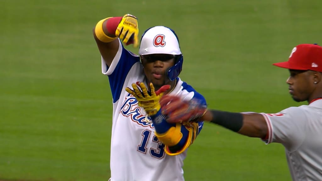 Atlanta Braves' Ronald Acuna Jr. (13) blows a bubble after he hit a two-run home  run during the fifth inning of the team's baseball game against the Miami  Marlins on Friday, Aug.