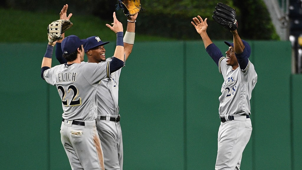 PITTSBURGH, PA - SEPTEMBER 21: Curtis Granderson #28 of the Milwaukee Brewers celebrates with Christian Yelich #22 and Keon Broxton #23 after the final out in an 8-3 win over the Pittsburgh Pirates at PNC Park on September 21, 2018 in Pittsburgh, Pennsylvania. (Photo by Justin Berl/Getty Images)