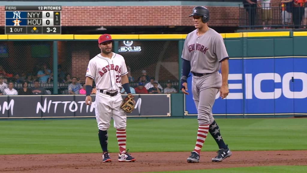 Jose Altuve had a little help posing for a picture next to Aaron Judge