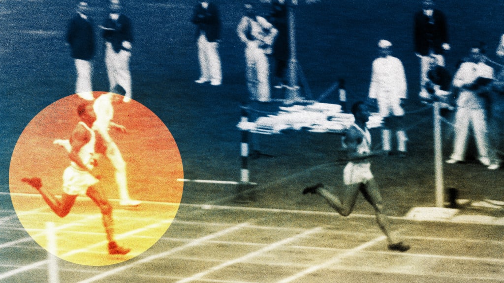 Mack Robinson finishes second behind Jesse Owens at the 1936 Summer Olympics.