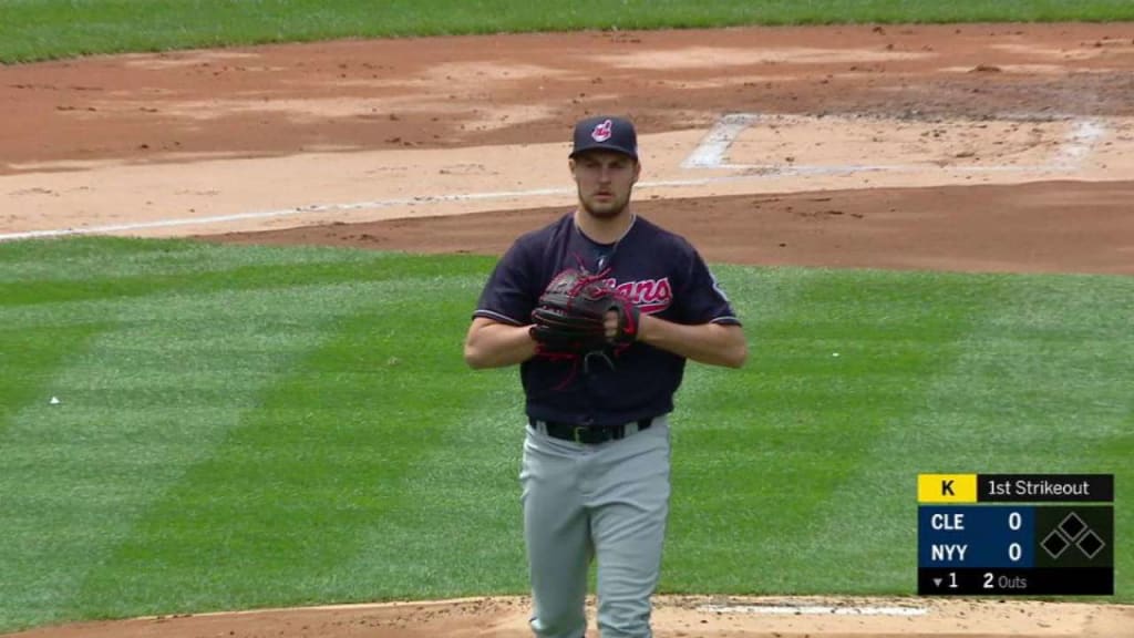 Cleveland Indians shortstop Francisco Lindor commits a fielding error on a  ground ball by New York Yankees' Ronald Torreyes with the bases loaded  during the fifth inning of a baseball game allowing