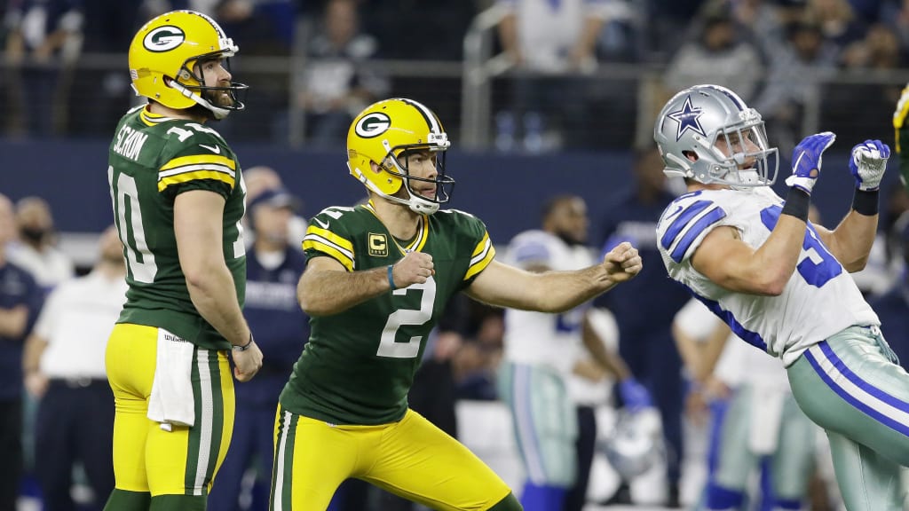 Georgetown's Mason Crosby kicks past the Cowboys