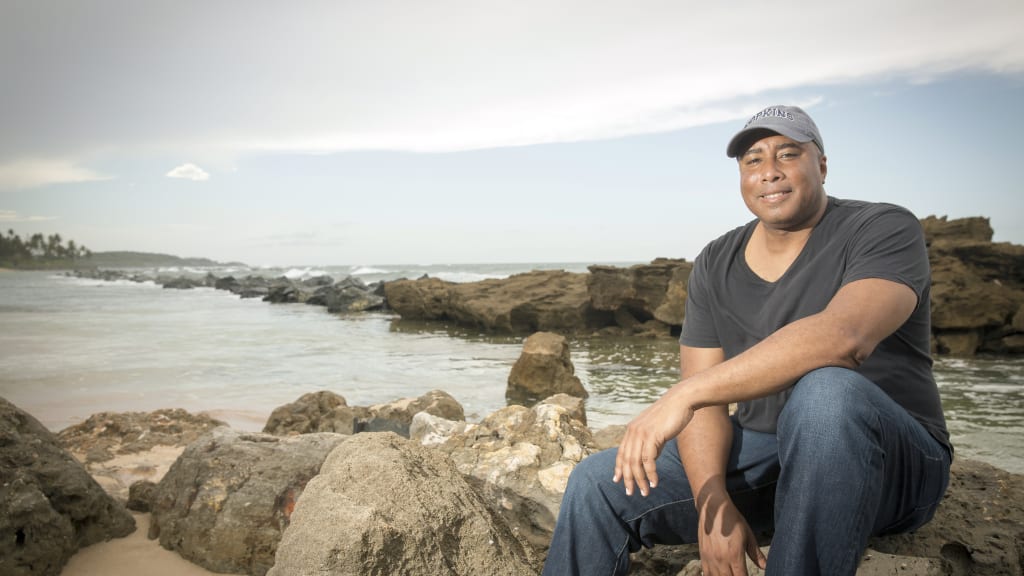 Bernie Williams near his childhood home in Puerto Rico