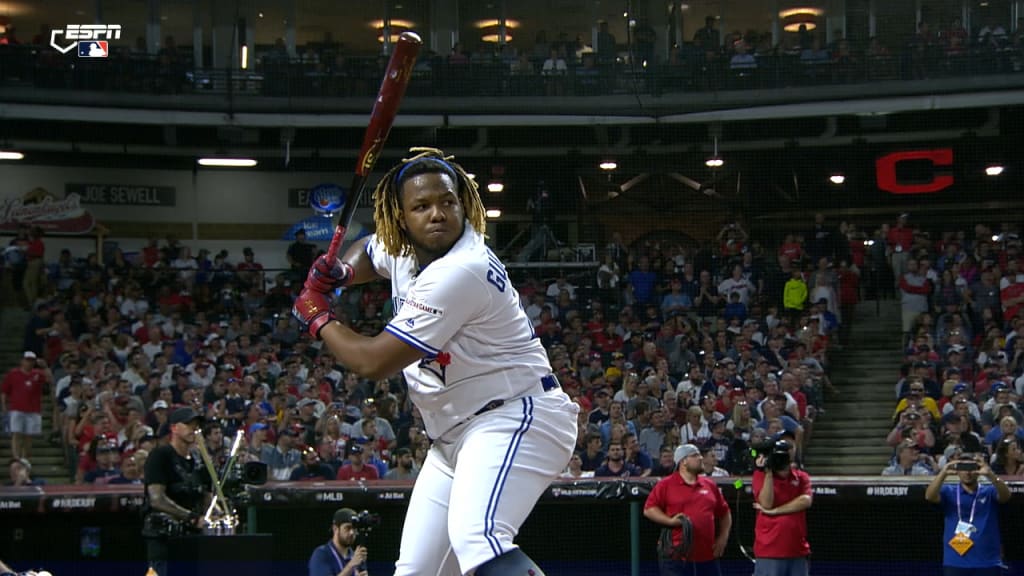 Vladimir Guerrero strikes a pose after monster softball home run