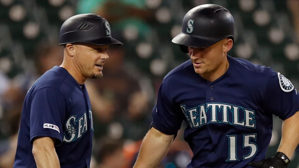 Seattle Mariners manager Scott Servais, bench coach Manny Acta