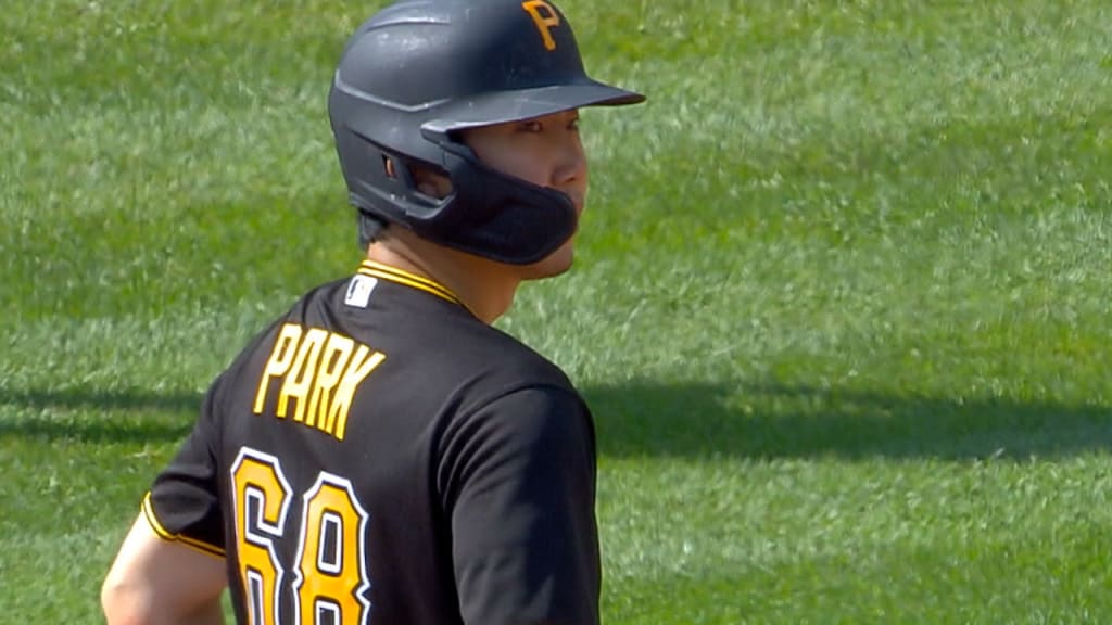 Pittsburgh Pirates' Yoshi Tsutsugo, left, tips his helmet as he