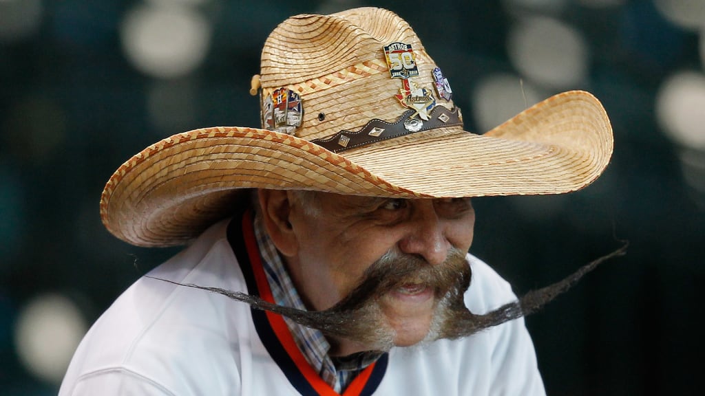 This Astros fan's mustache is at least three times as wide as his face