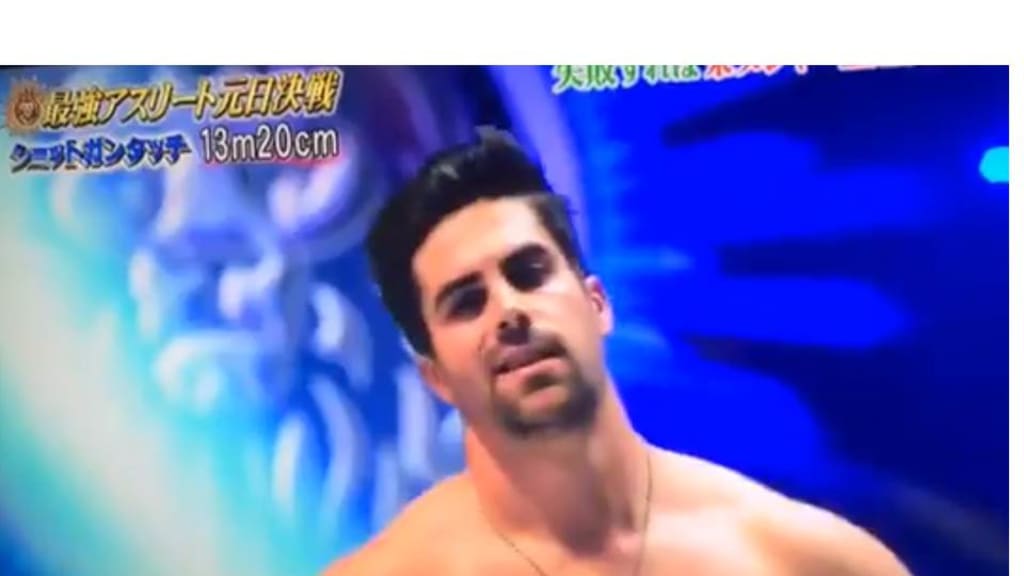 A shirtless Whit Merrifield participated on a fantastic Japanese game show