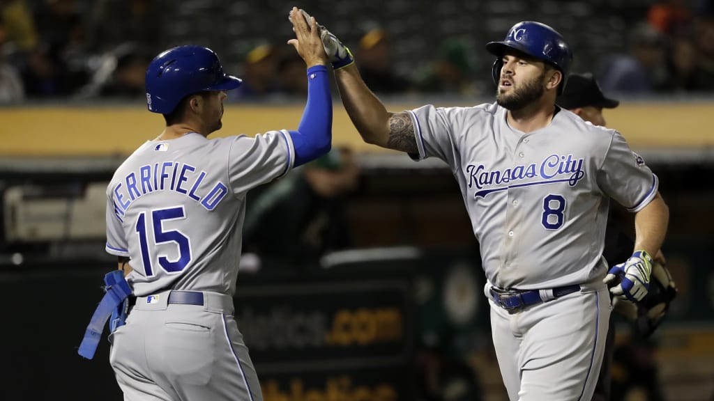 Kansas City Royals' Mike Moustakas, right, celebrates his two-run home run with Whit Merrifield (15) during the eighth inning of the team's baseball game against the Oakland Athletics on Friday, June 8, 2018, in Oakland, Calif. (AP Photo/Marcio Jose Sanchez)