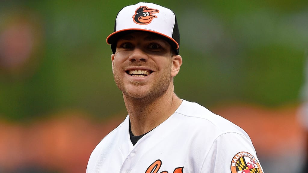 "We love the city of Baltimore," Chris Davis said of community involvement with his wife, Jill. (AP)