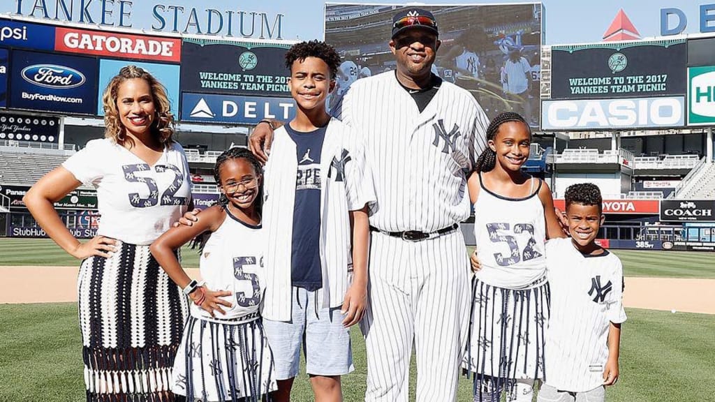 New York Yankees pitcher CC Sabathia, his wife Amber Sabathia and