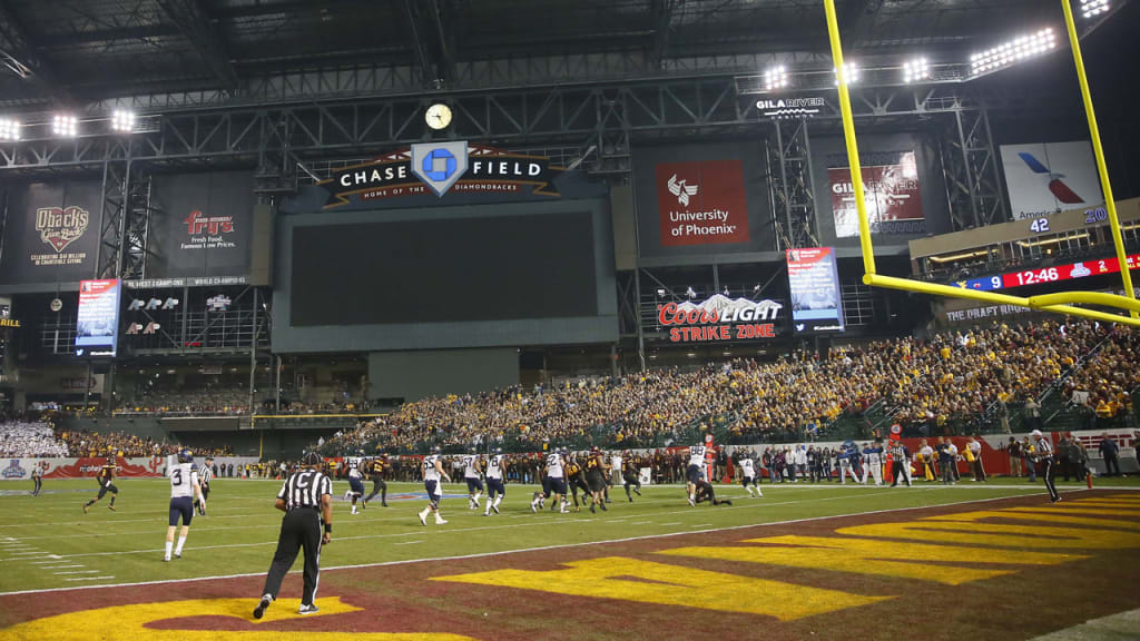 The Chase Field diamond was converted to a gridiron for Saturday's Cactus Bowl in Phoenix. (AP)