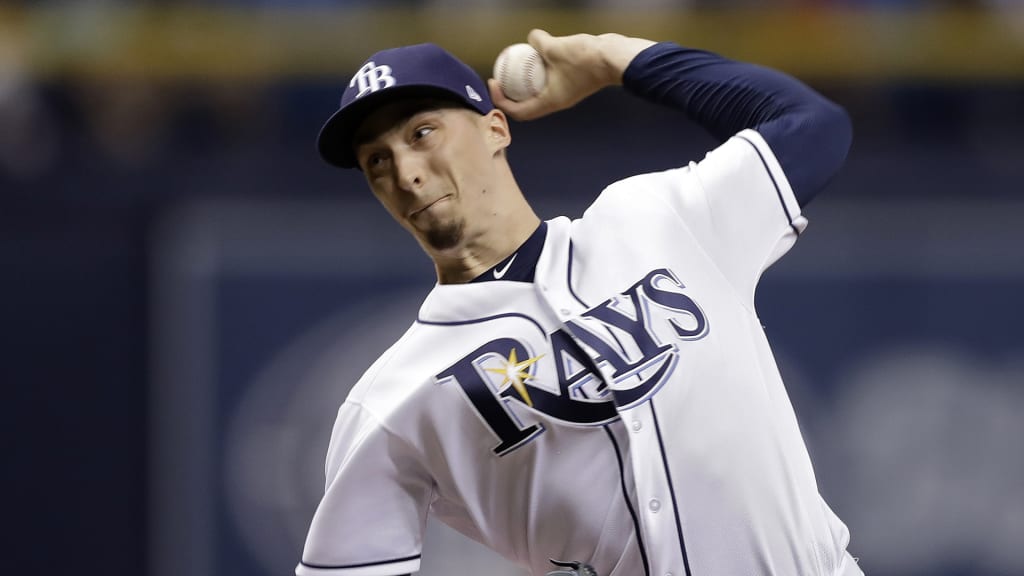 Tampa Bay Rays' pitcher Blake Snell stands between Los Angeles