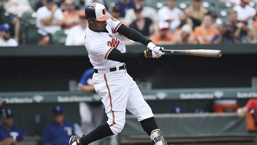 Baltimore Orioles' Adam Jones connects for a three run double against the Texas Rangers in the third inning of a baseball game, Sunday, July 15, 2018, in Baltimore. (AP Photo/Gail Burton)