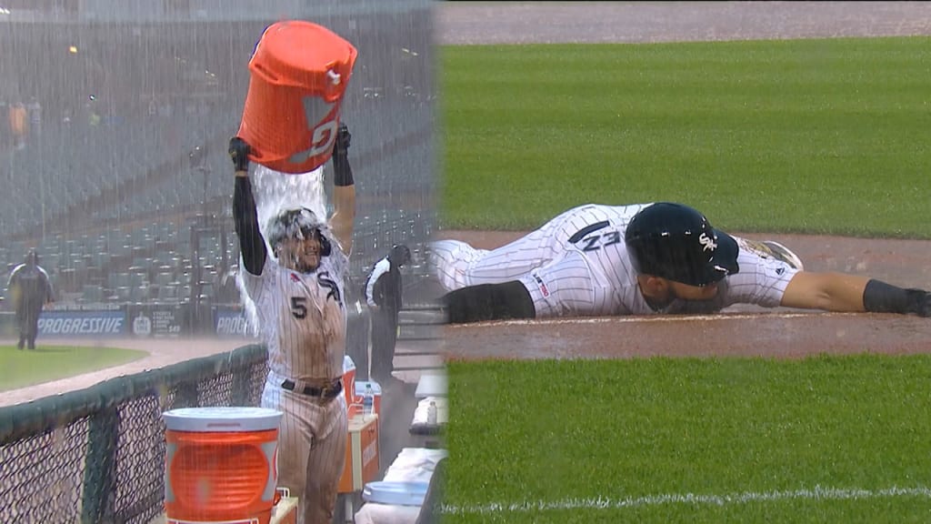 Yolmer Sanchez has fun in the pouring rain | MLB.com