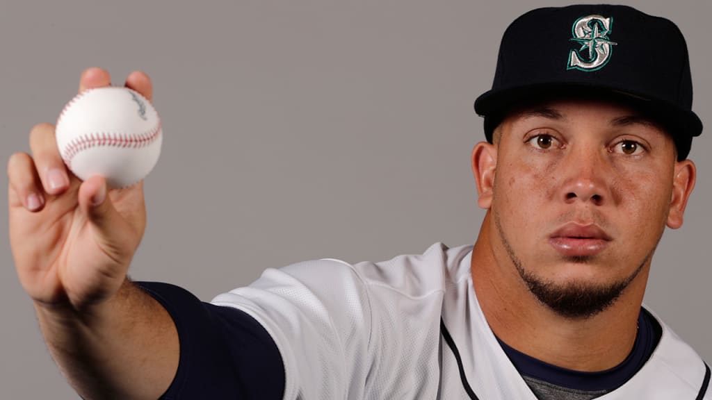 Jonathan Aro was one of five players moved on Sunday as the Mariners trimmed their camp roster to 40 players. (AP)