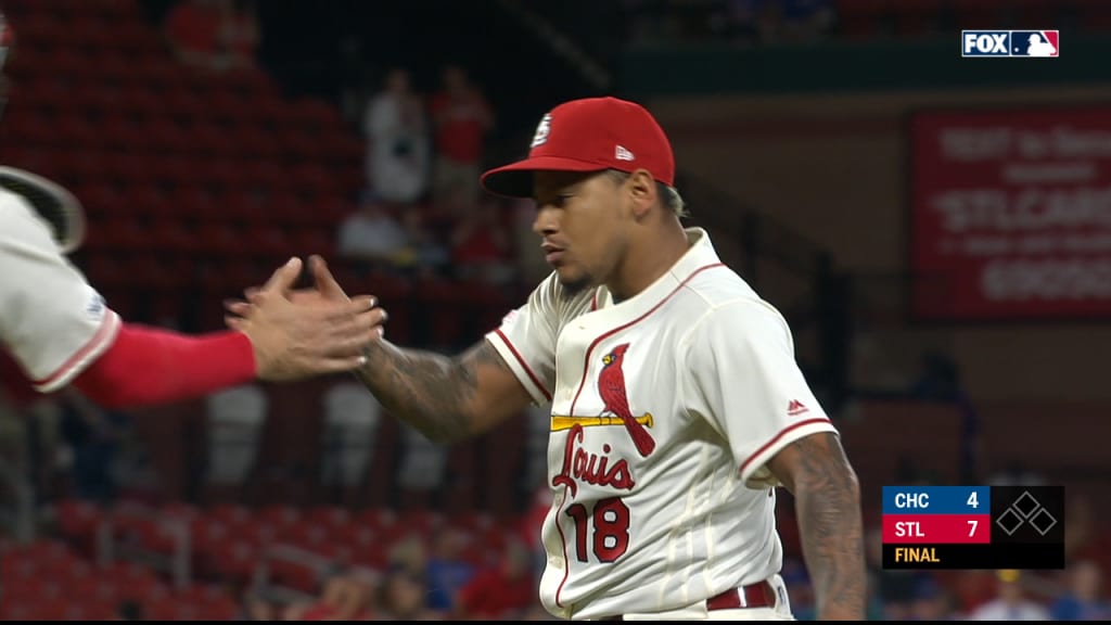 Cardinals beat Cubs after lengthy rain delay