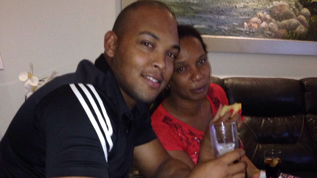 "I think my mother is proud of the man I have become," Yasmany Tomas said.