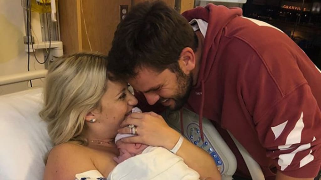 Mike Moustakas, wife welcome baby boy