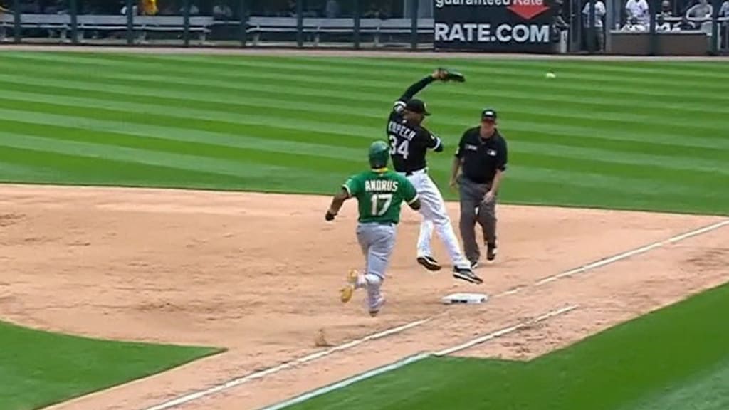 Oakland Athletics center fielder Starling Marte, left, and shortstop Elvis  Andrus, collide going after a fly ball hit by Chicago White Sox's Jose  Abreu in the ninth inning of a baseball game