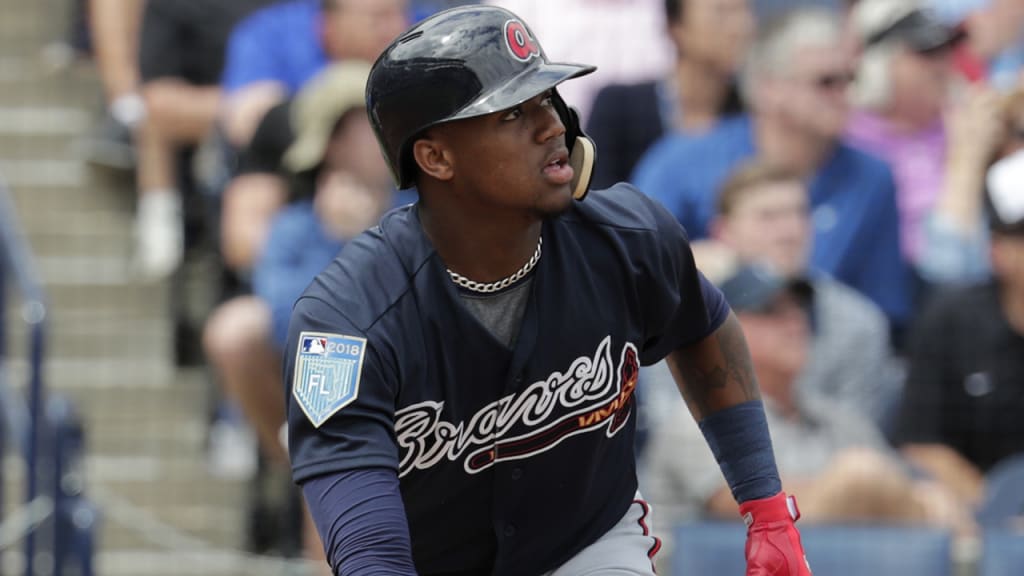 Atlanta Braves' Ronald Acuna watches after hitting a two run home run during the first inning of a baseball spring exhibition game against the New York Yankees, Friday, March 2, 2018, in Tampa, Fla. (AP Photo/Lynne Sladky)