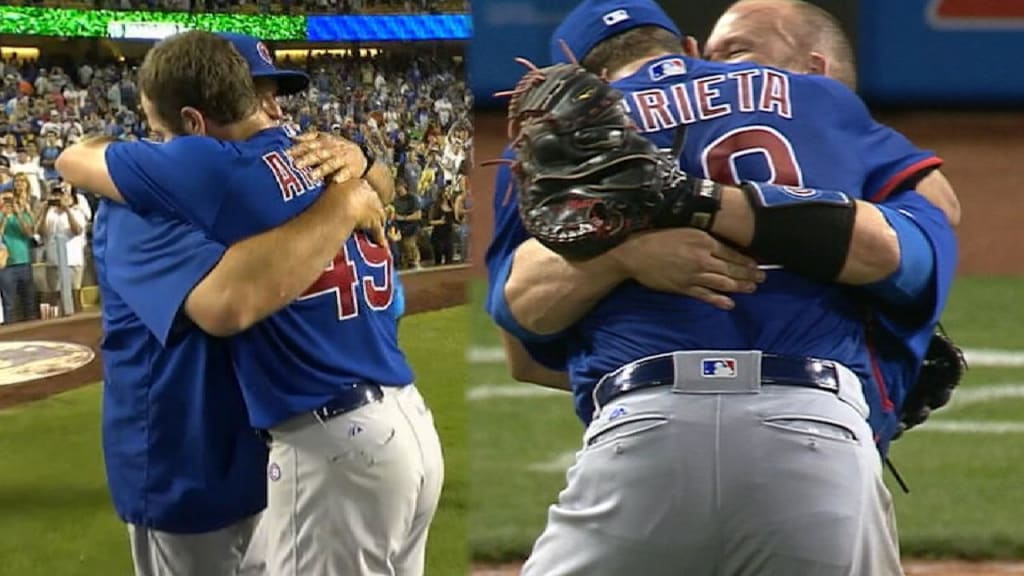 Bryant's Travis Wood takes off his shirt at Cubs rally