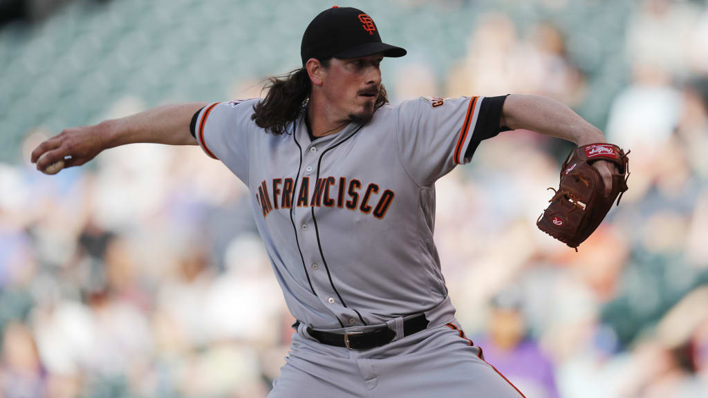 San Francisco Giants starting pitcher Jeff Samardzija winds up during the first inning of the team's baseball game against the Colorado Rockies on Tuesday, May 29, 2018, in Denver. (AP Photo/David Zalubowski)