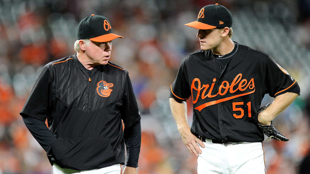 BALTIMORE, MD - JUNE 15: Manager Buck Showalter #26 of the Baltimore Orioles talks with Corban Joseph #51 during the seventh inning against the Miami Marlins at Oriole Park at Camden Yards on June 15, 2018 in Baltimore, Maryland. (Photo by Greg Fiume/Getty Images)
