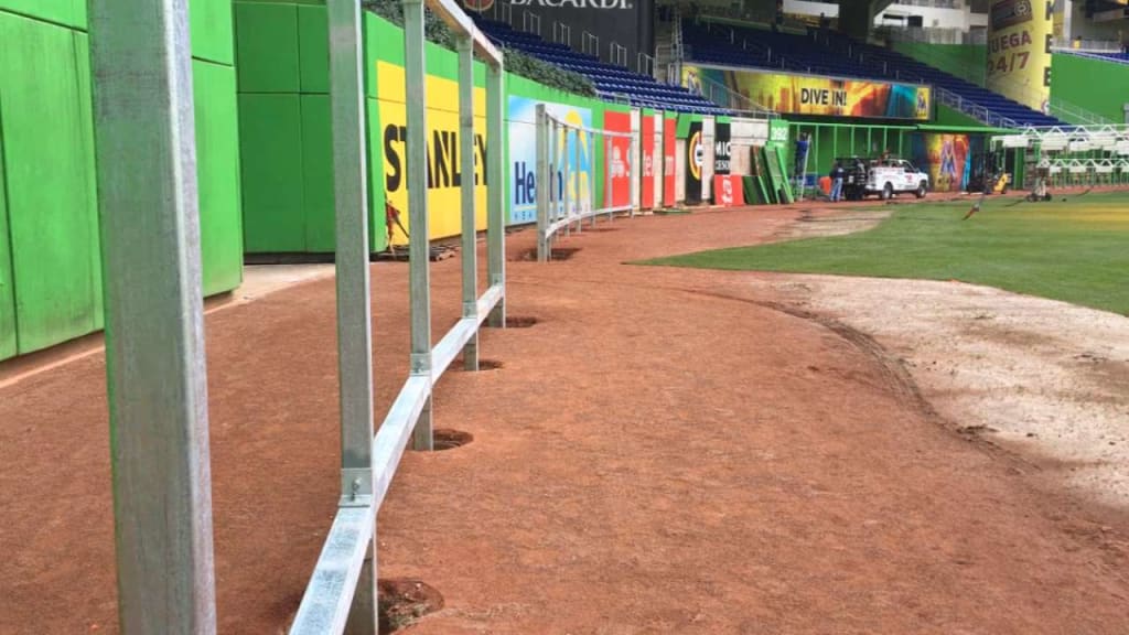 Marlins moving in fences, changing from grass to synthetic surface