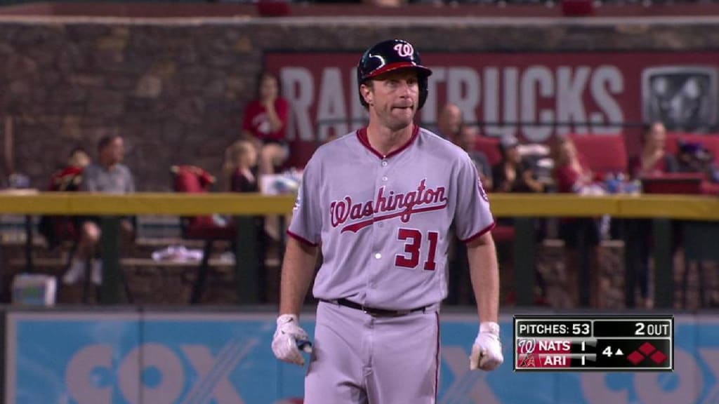 Ryan Zimmerman and Max Scherzer wore full Caps gear while leading