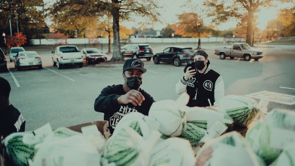 Tim Anderson and his wife, Bria, donated turkeys through their League of Leaders organization.
