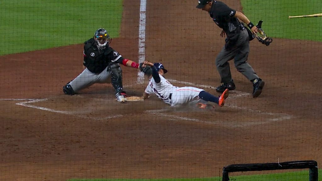 Houston Astros' Michael Brantley runs up the first base line